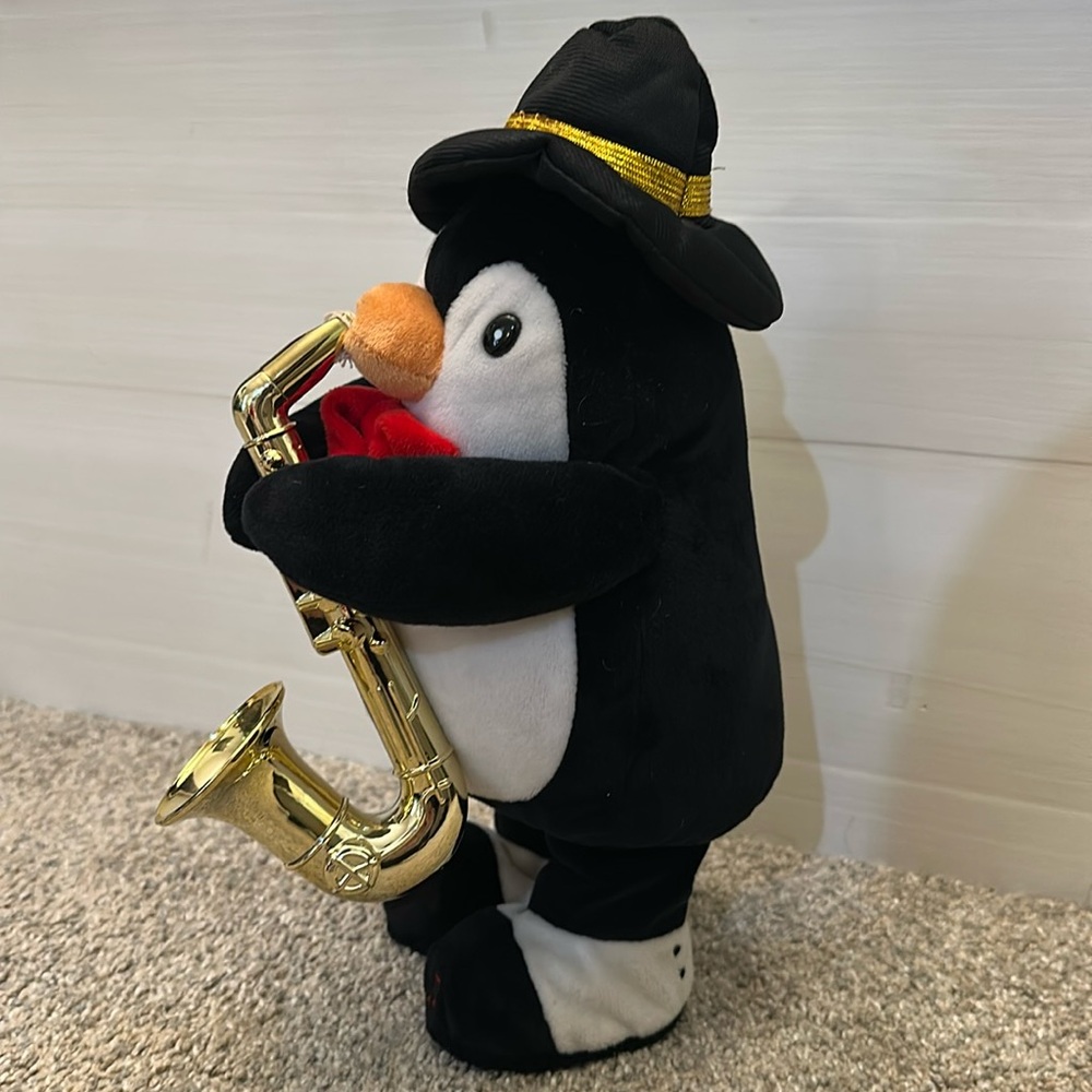 Black and White Penguin Stuffed Animal with Saxophone